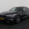 Photo 1 of 43 of WBAJB91010G463402 BMW 5 Serie M550i xDrive High Executive 4-drs Sedan