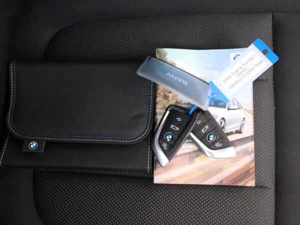 BMW 3 Serie Touring 330e High Executive